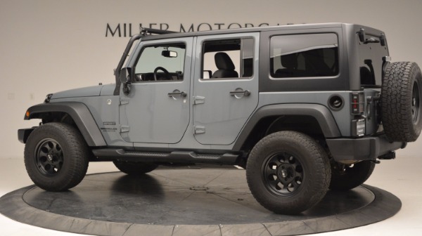 Used 2014 Jeep Wrangler Unlimited Sport for sale Sold at McLaren Greenwich in Greenwich CT 06830 4